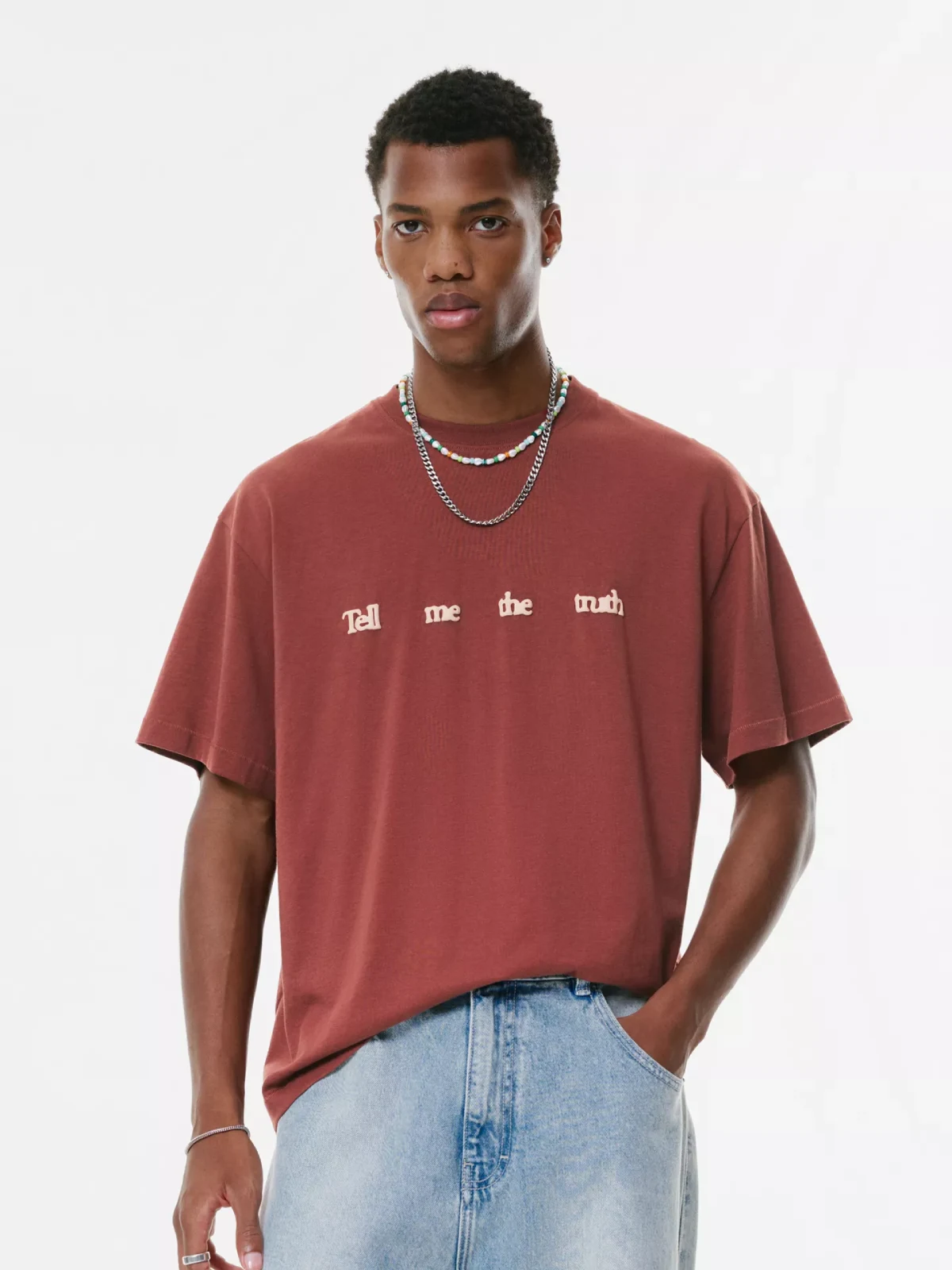 T-shirt with graphic and slogan